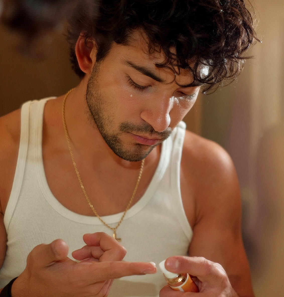 Man applying Yerba Glow